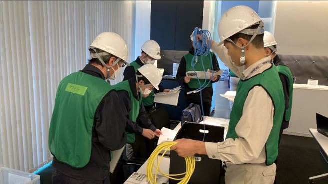 図版：参集要員による拠点設置訓練（技術研究所）